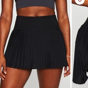 Fabletics Black Pleated Mini Skirt w/ half zip sports bra